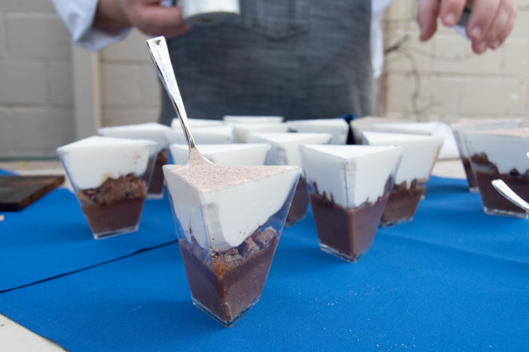 pudding dessert individually prepared in a cup with a spoon