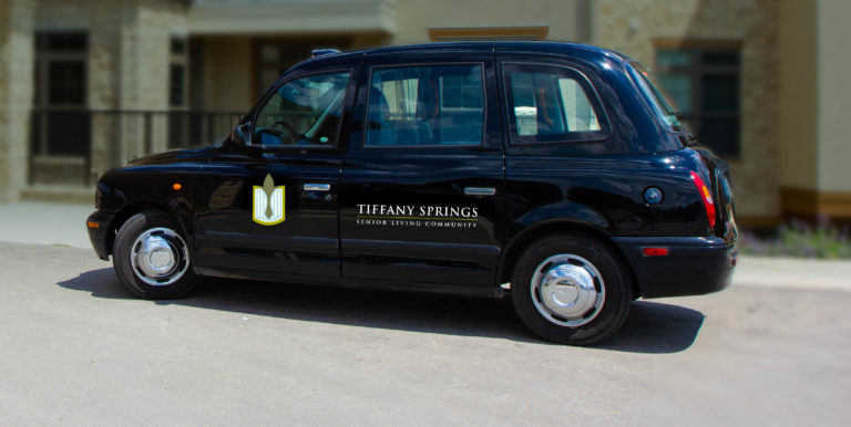 Tiffany Spring's black London Taxi parked outside of Tiffany Springs